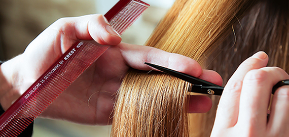 Hairstylist with goldilocks comb